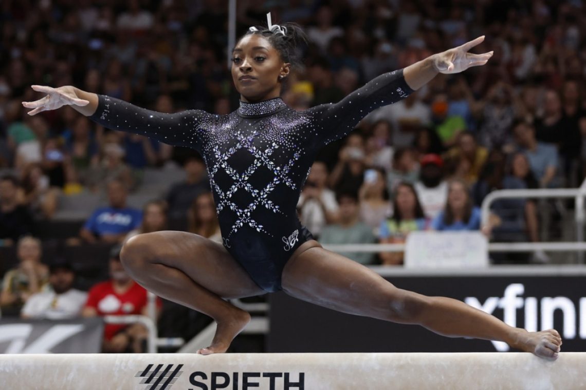 Biles po vrnitvi do osmega naslova v mnogoboju